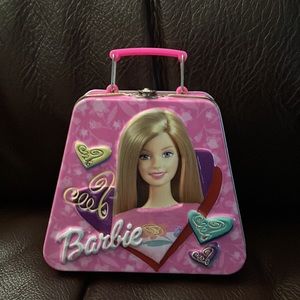 Barbie tin suitcase.